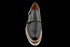 Zapatillas de vestir con doble hebilla y diseño perforado en negro
